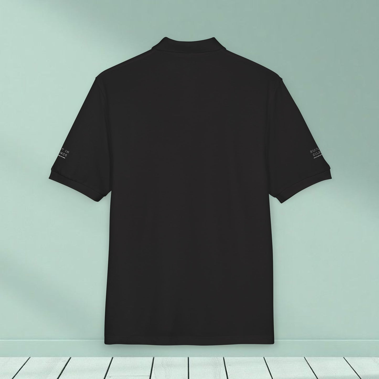 Embroidered Black Polo Shirt — Minimal Wing Crest Logo